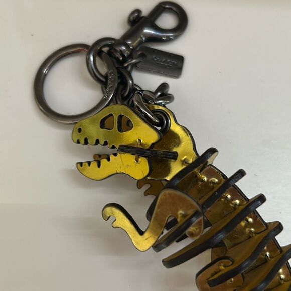 COACH Gold Rexi Puzzle Keychain - Picture 3 of 5